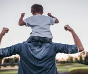 Dad and toddler son outdoors