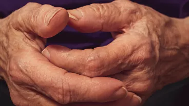 Close up of senior hands.